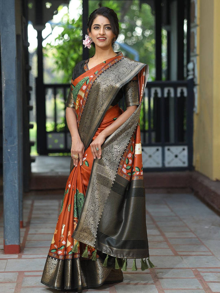 Rust Printed Kanjivaram Silk Saree with Black Zari Border & Traditional Motifs
