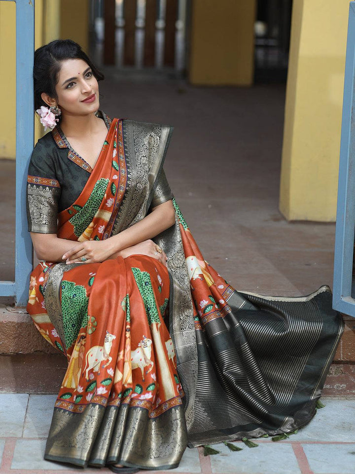 Rust Printed Kanjivaram Silk Saree with Black Zari Border & Traditional Motifs