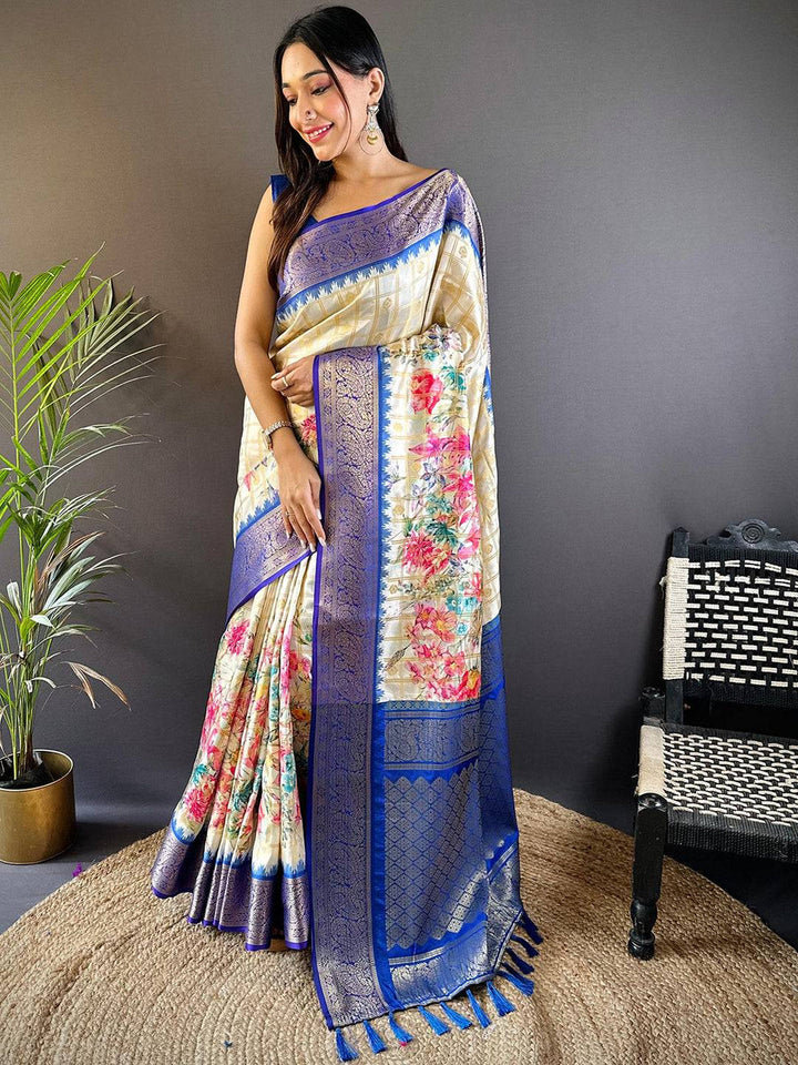 Ivory Floral Printed Kanjivaram Silk Saree with Royal Blue Zari Border & Tassel Pallu
