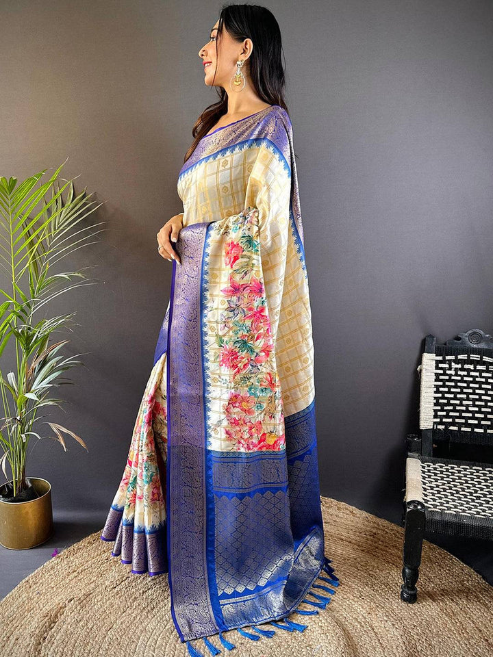 Ivory Floral Printed Kanjivaram Silk Saree with Royal Blue Zari Border & Tassel Pallu