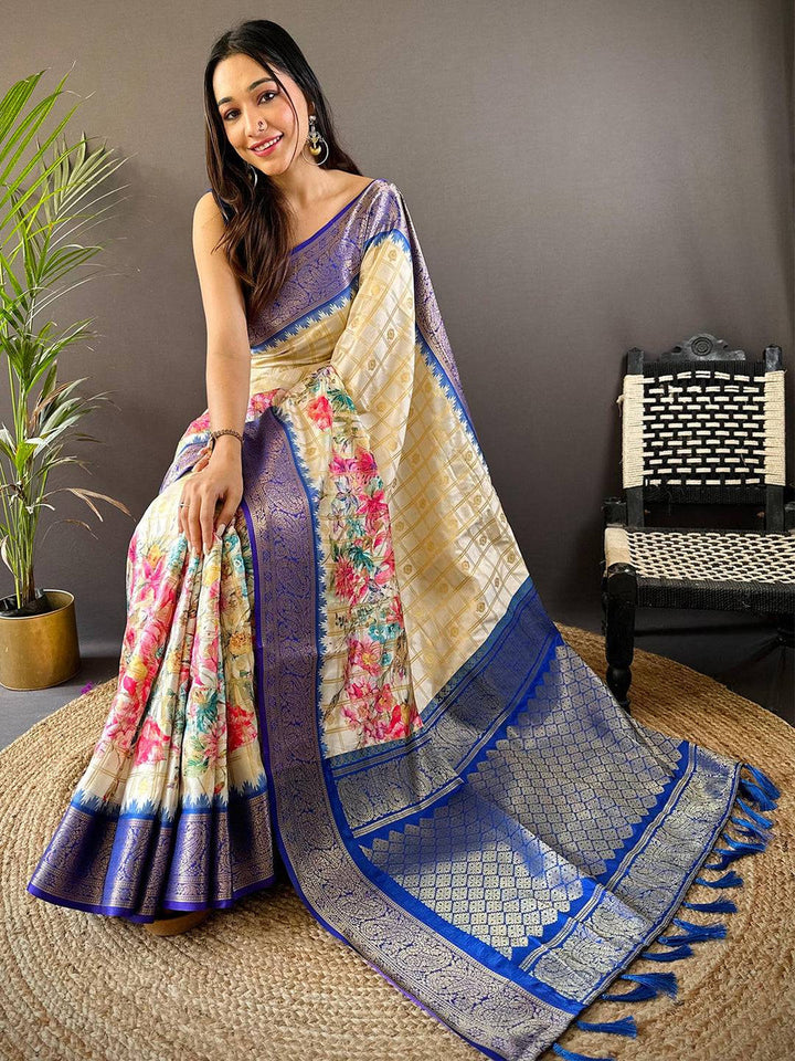 Ivory Floral Printed Kanjivaram Silk Saree with Royal Blue Zari Border & Tassel Pallu