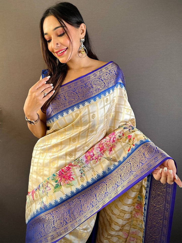 Ivory Floral Printed Kanjivaram Silk Saree with Royal Blue Zari Border & Tassel Pallu