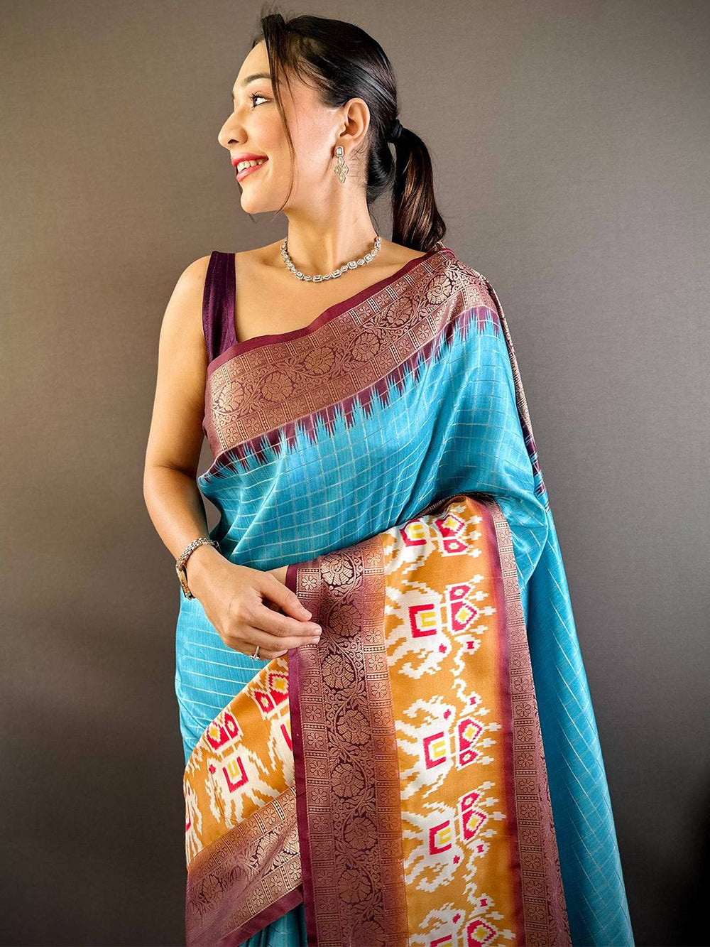 Turquoise Blue Soft Silk Saree with Ikat Woven Border & Antique Zari Pallu