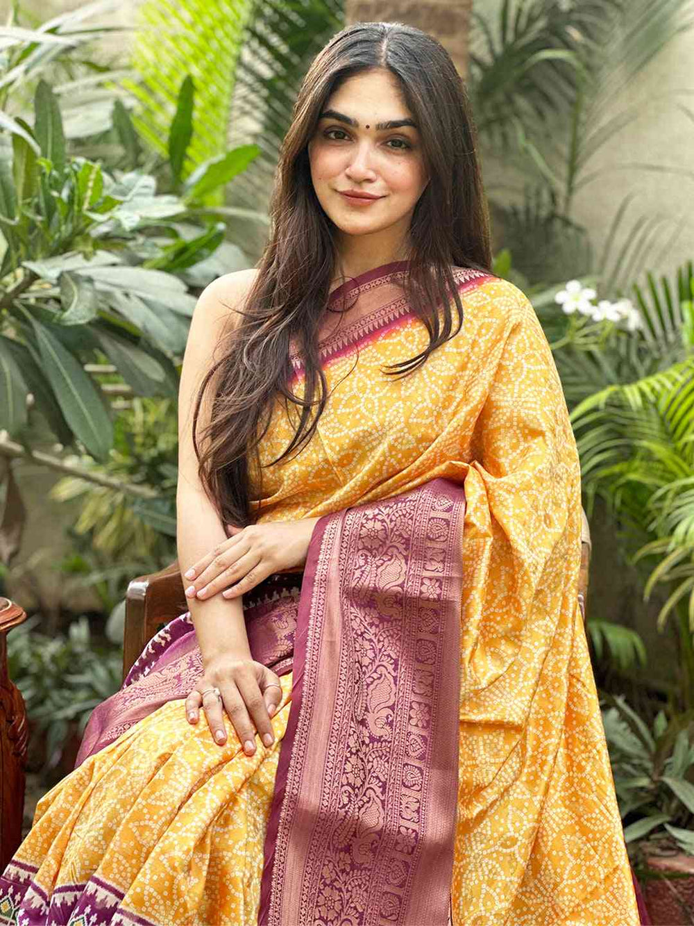 Yellow Patola Print Silk Saree with Maroon Zari Border & Traditional Motif Pallu