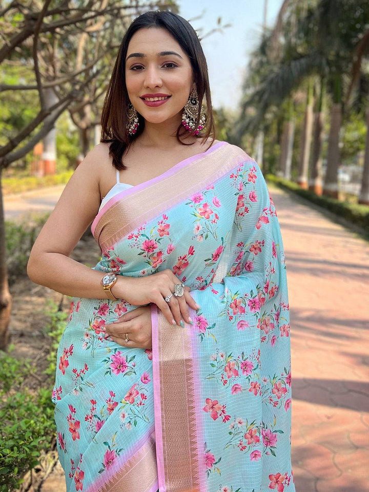 Pastel Blue Floral Printed Linen Saree with Pink Border & Tassels