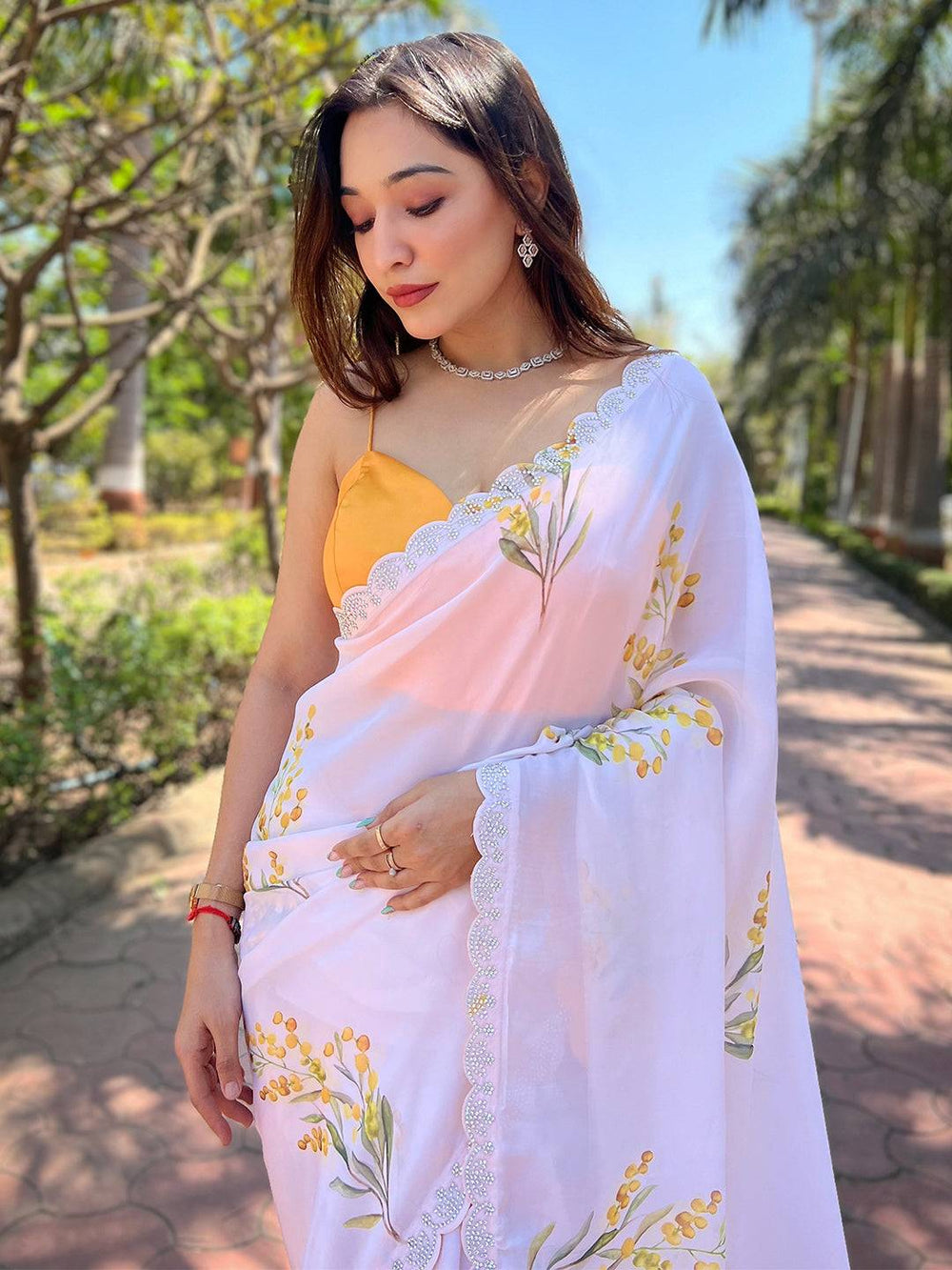 White Floral Printed Georgette Saree with Lace Border
