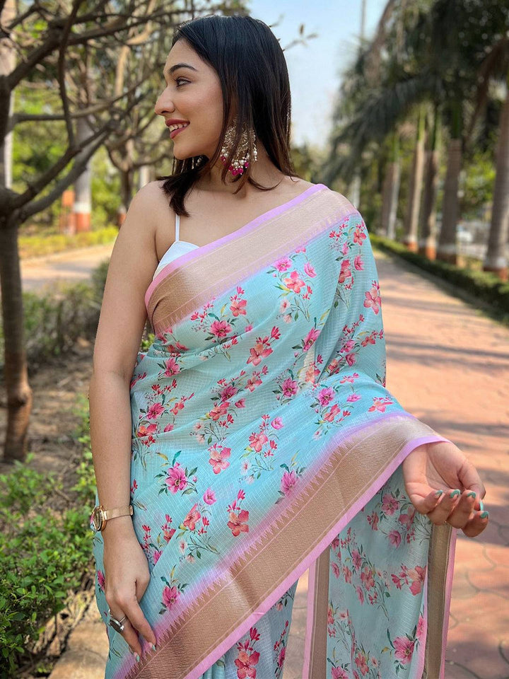 Pastel Blue Floral Printed Linen Saree with Pink Border & Tassels