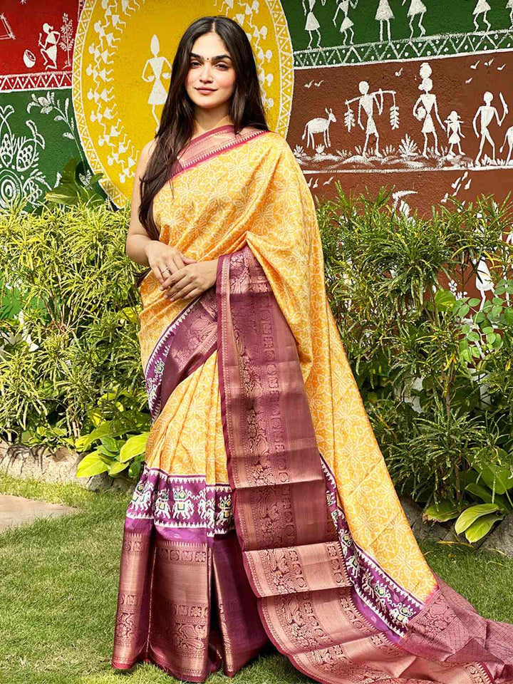 Yellow Patola Print Silk Saree with Maroon Zari Border & Traditional Motif Pallu