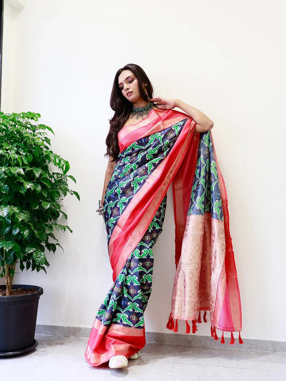 Navy Blue Patola Print Silk Saree with Pink Zari Border & Elegant Woven Pallu