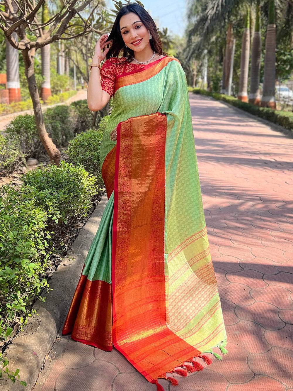 Mint Green & Orange Kanjivaram Silk Saree with Rich Zari Weaving