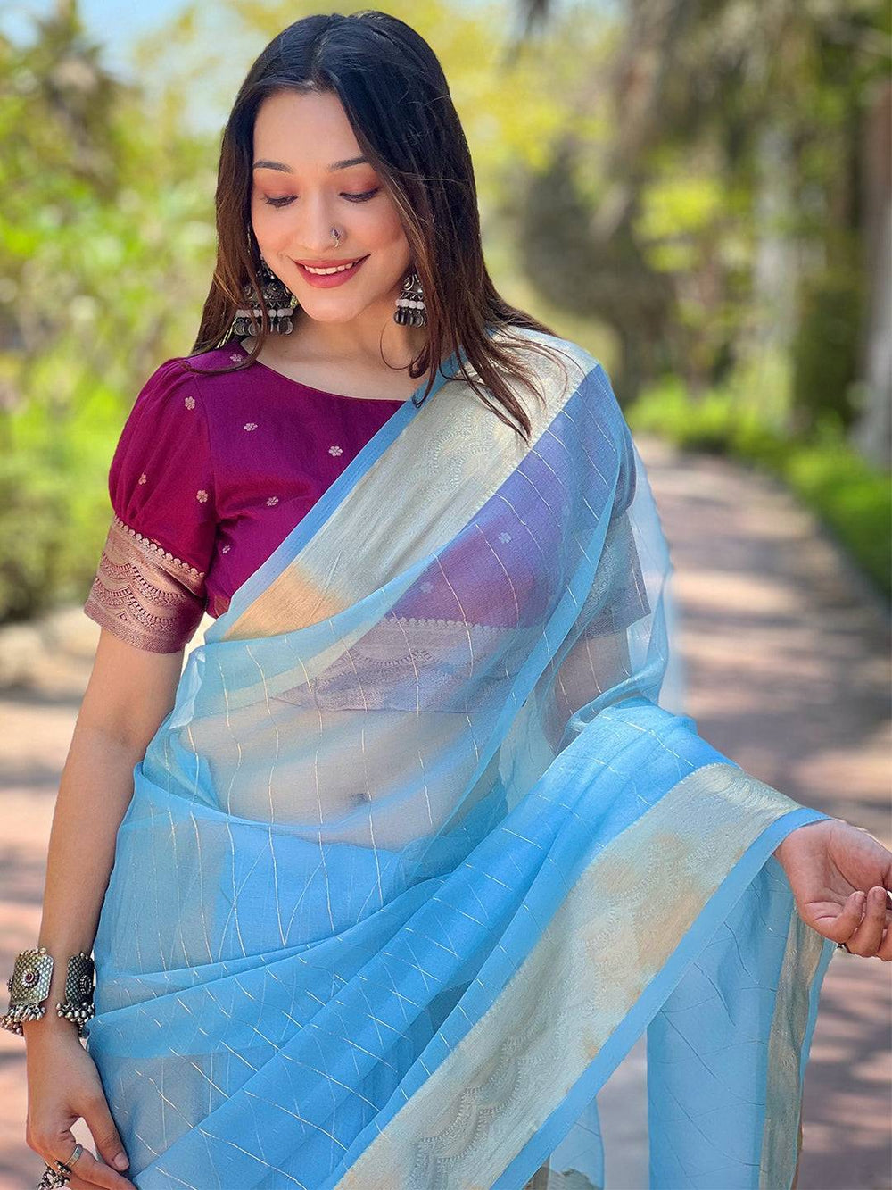 Sky Blue Organza Saree with Gold Zari Border & Subtle Woven Design