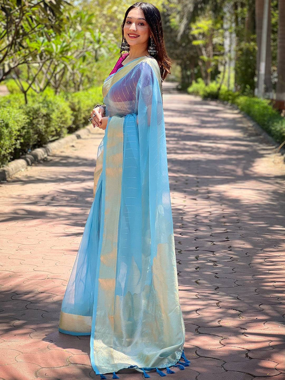 Sky Blue Organza Saree with Gold Zari Border & Subtle Woven Design