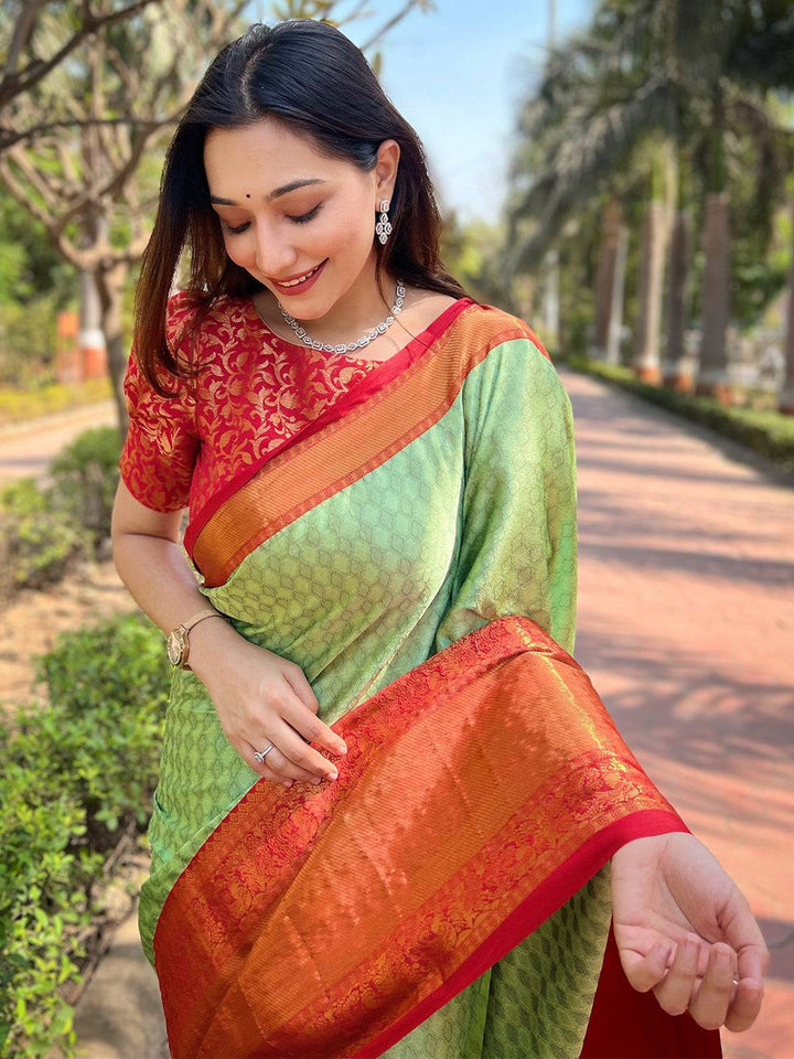 Mint Green & Orange Kanjivaram Silk Saree with Rich Zari Weaving