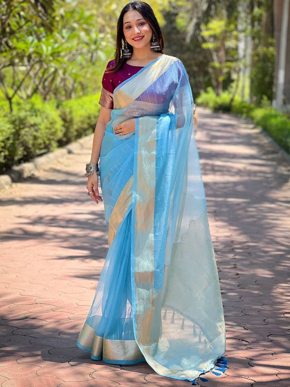 Sky Blue Organza Saree with Gold Zari Border & Subtle Woven Design