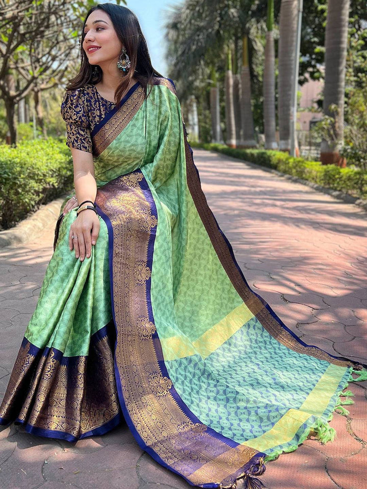 Elegant Light Green Banarasi Silk Saree with Navy Blue Zari Border