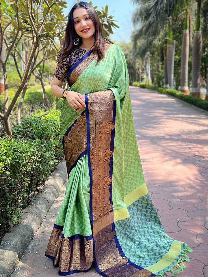 Elegant Light Green Banarasi Silk Saree with Navy Blue Zari Border