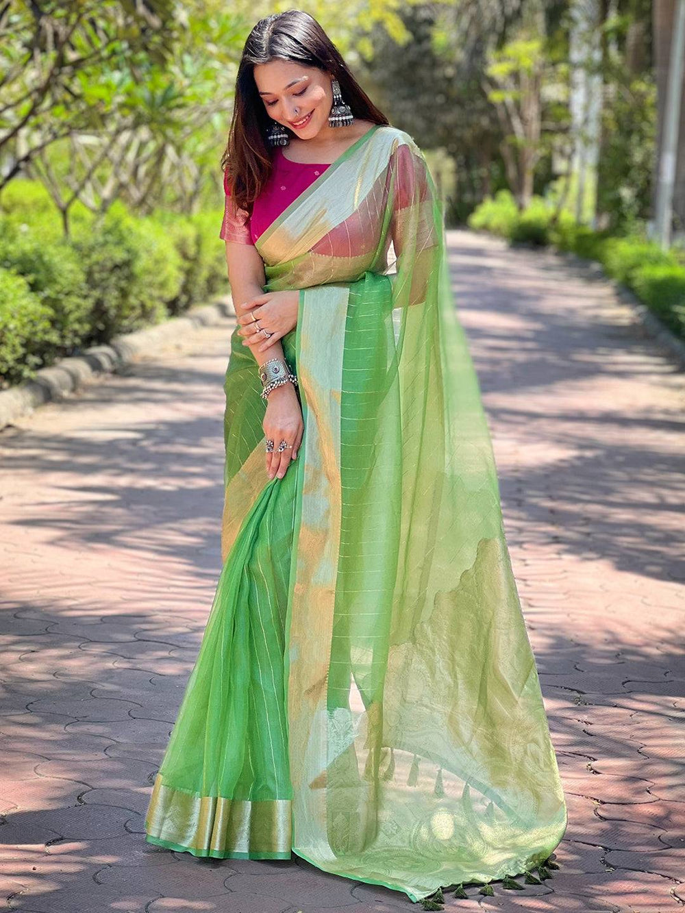 Light Green Soft Organza Saree with Golden Zari Border & Contrast Pink Blouse