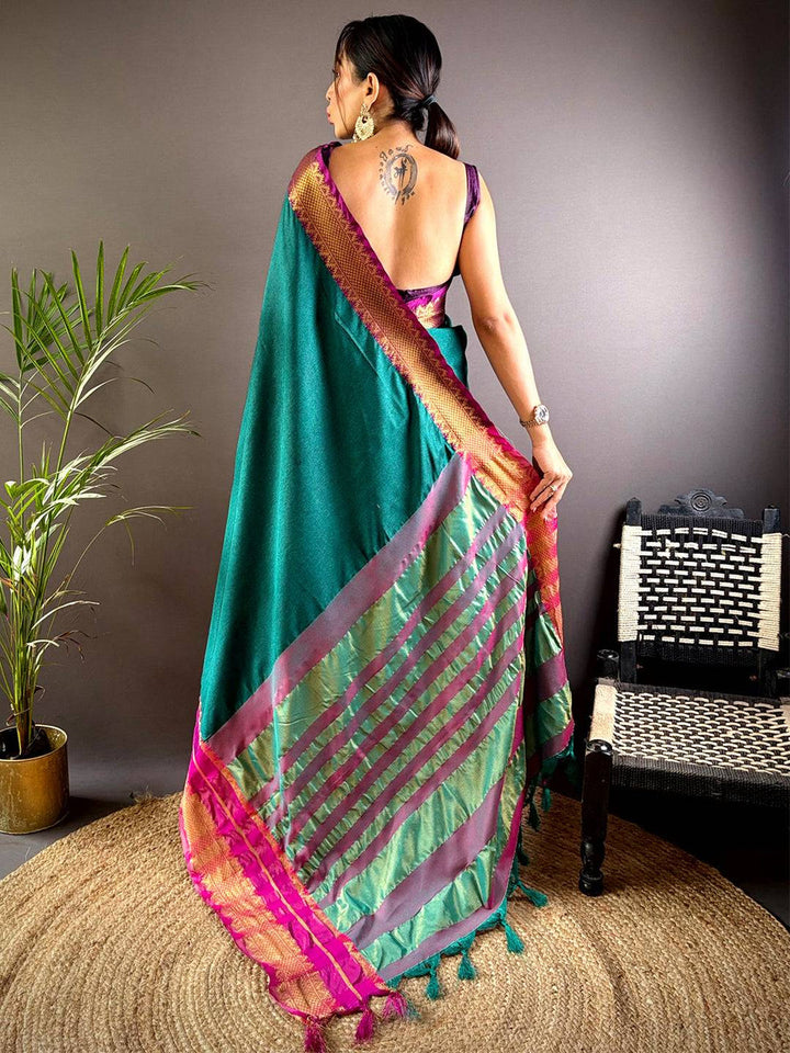 Emerald Green Soft Silk Saree with Pink–Gold Zari Border & Striped Pallu