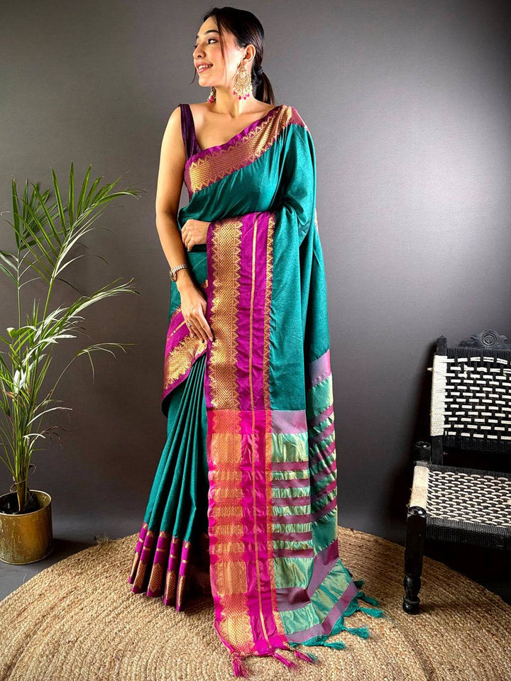Emerald Green Soft Silk Saree with Pink–Gold Zari Border & Striped Pallu