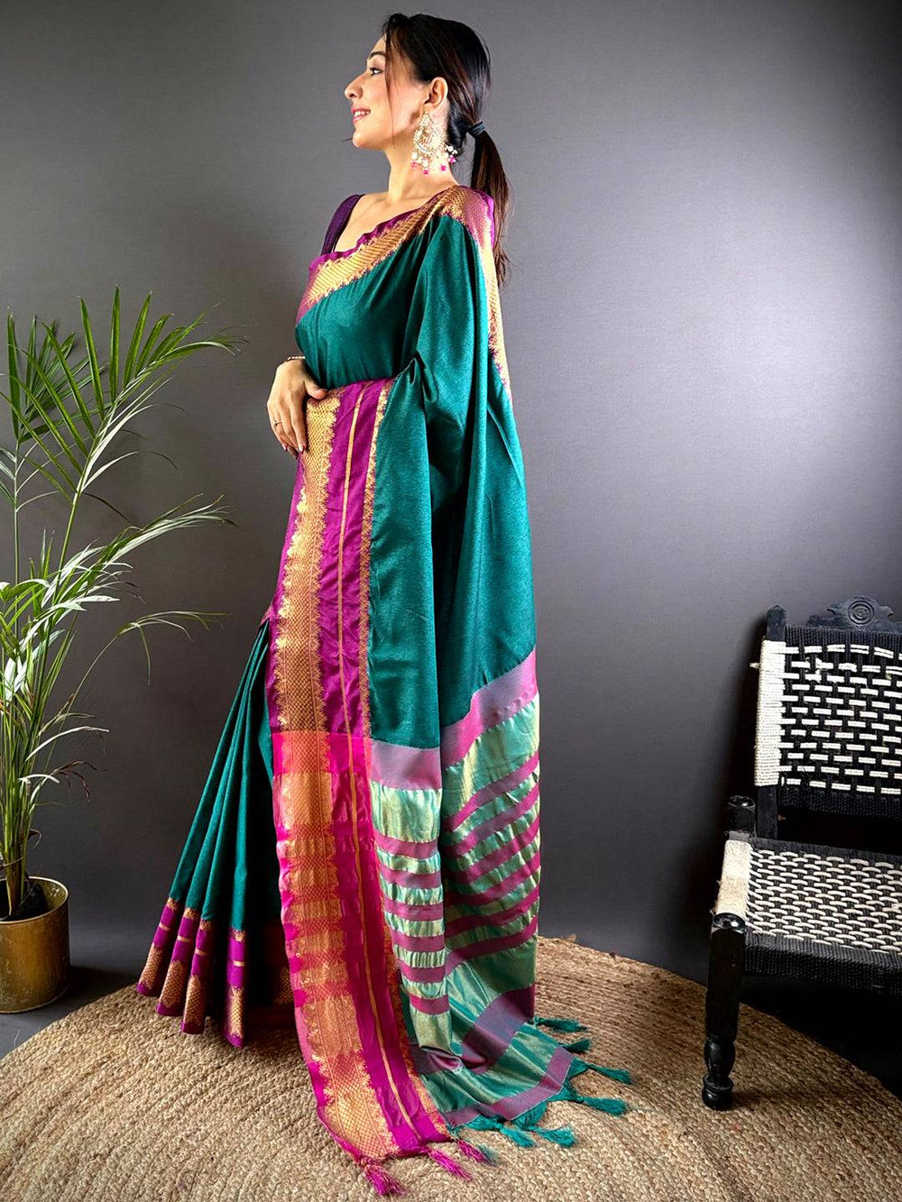 Emerald Green Soft Silk Saree with Pink–Gold Zari Border & Striped Pallu