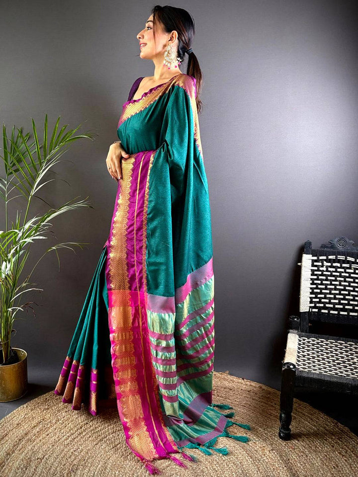 Emerald Green Soft Silk Saree with Pink–Gold Zari Border & Striped Pallu