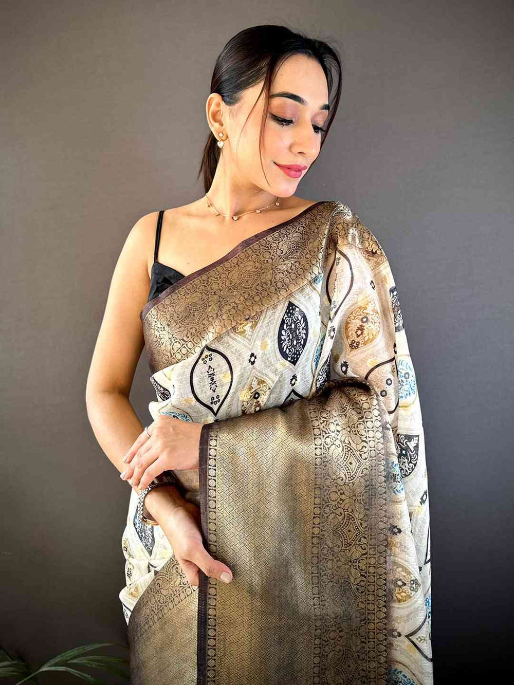 Cream & Gold Soft Silk Saree with Woven Geometric Motifs and Antique Gold Zari Border