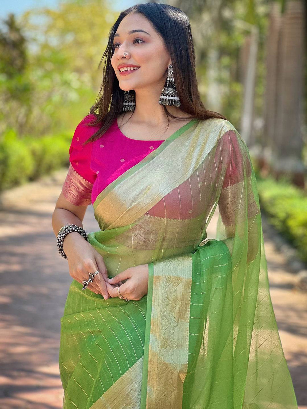Light Green Soft Organza Saree with Golden Zari Border & Contrast Pink Blouse