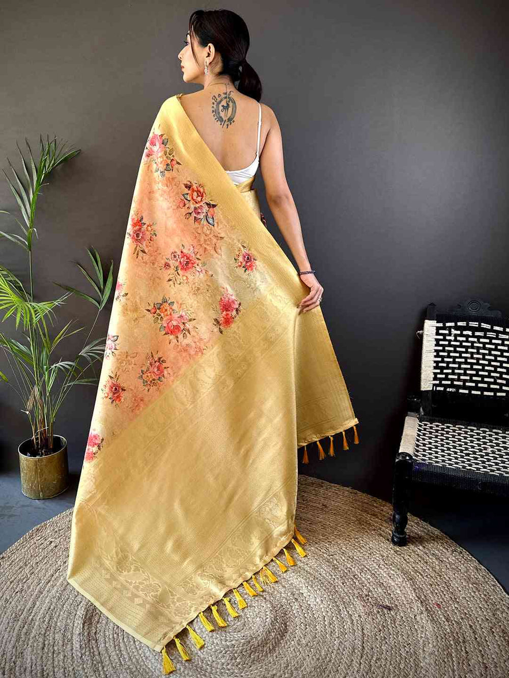 Pastel Yellow Soft Silk Saree with Subtle Floral Print & Elegant Tassel Pallu