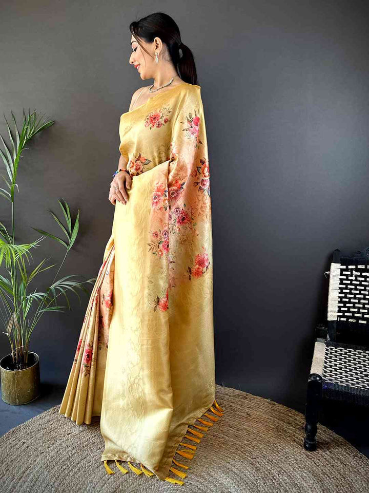Pastel Yellow Soft Silk Saree with Subtle Floral Print & Elegant Tassel Pallu