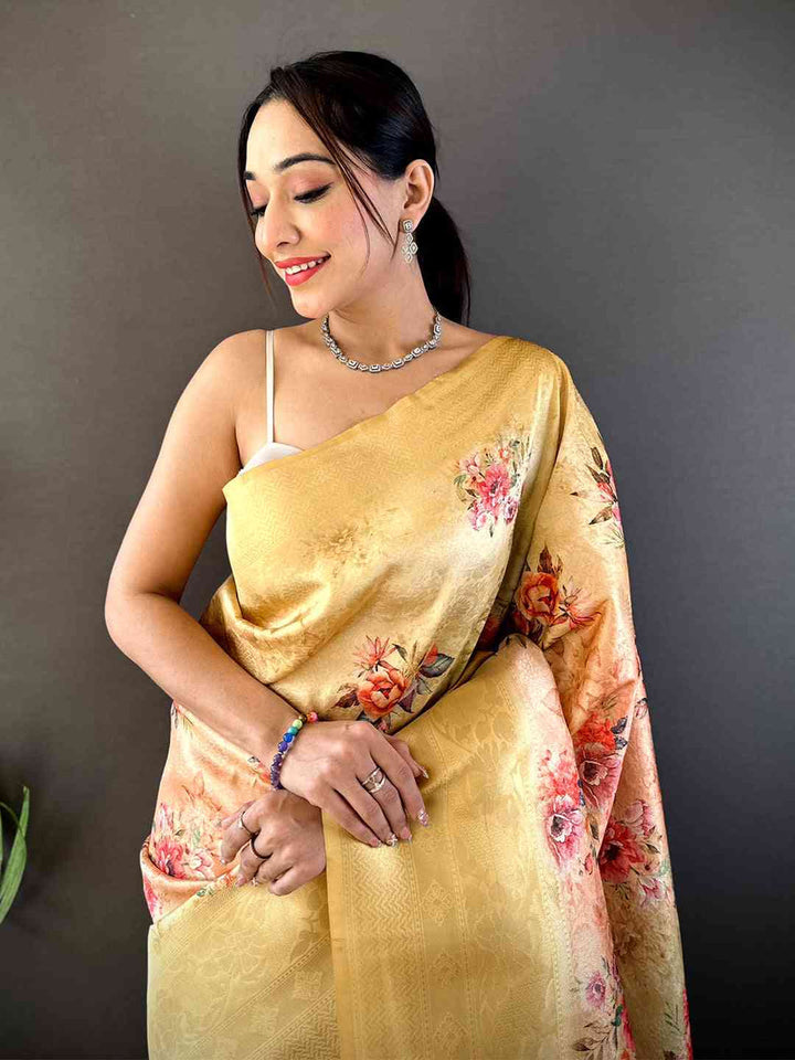 Pastel Yellow Soft Silk Saree with Subtle Floral Print & Elegant Tassel Pallu