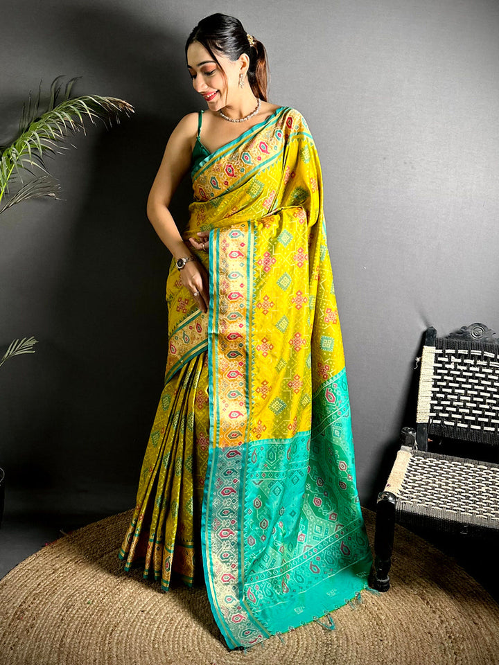 Yellow & Turquoise Soft Silk Patola Print Saree with Contrast Border