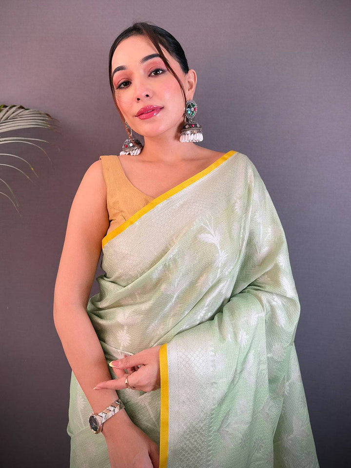 Pastel Green Soft Silk Saree with Silver Zari Weaving & Yellow Border