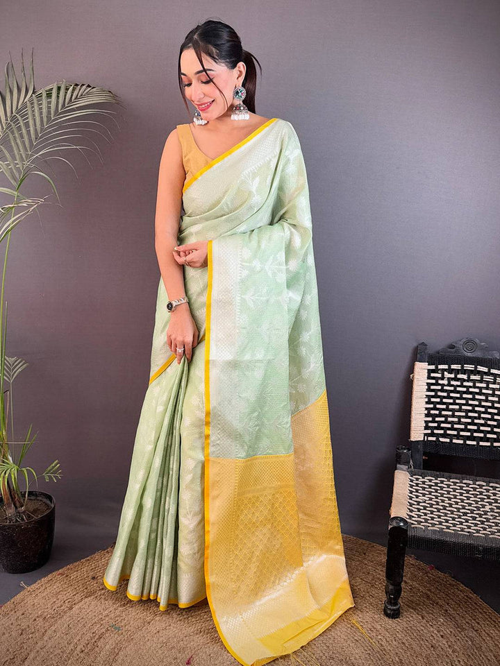 Pastel Green Soft Silk Saree with Silver Zari Weaving & Yellow Border