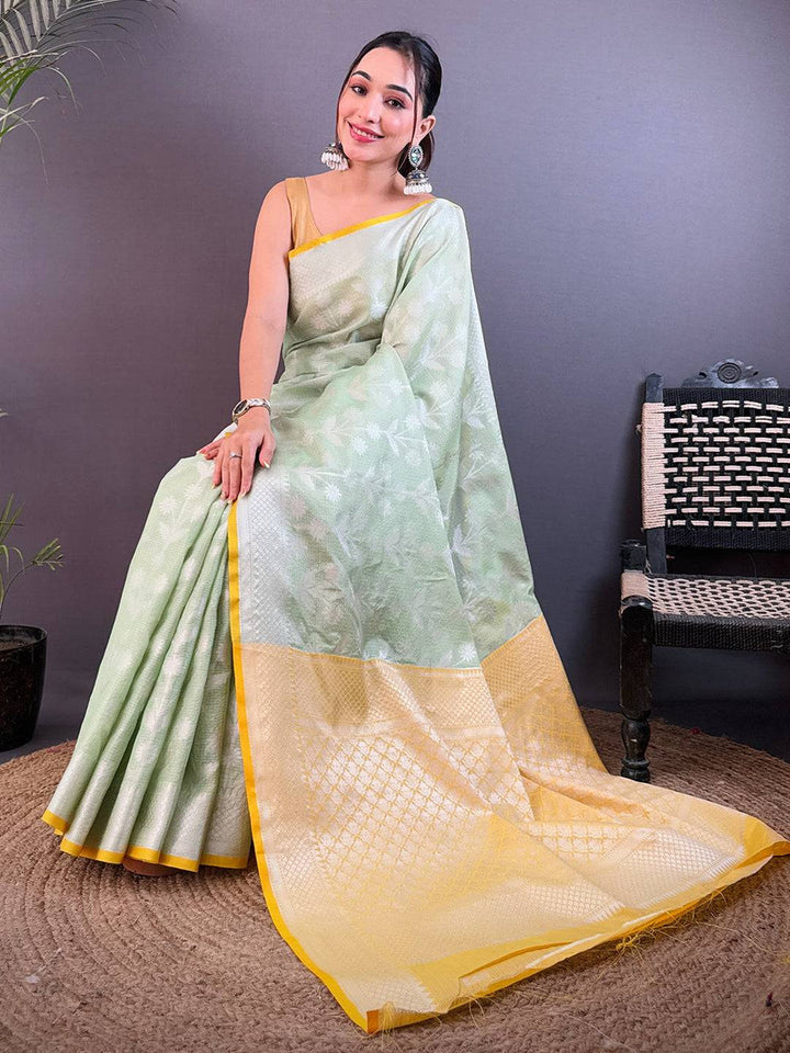 Pastel Green Soft Silk Saree with Silver Zari Weaving & Yellow Border