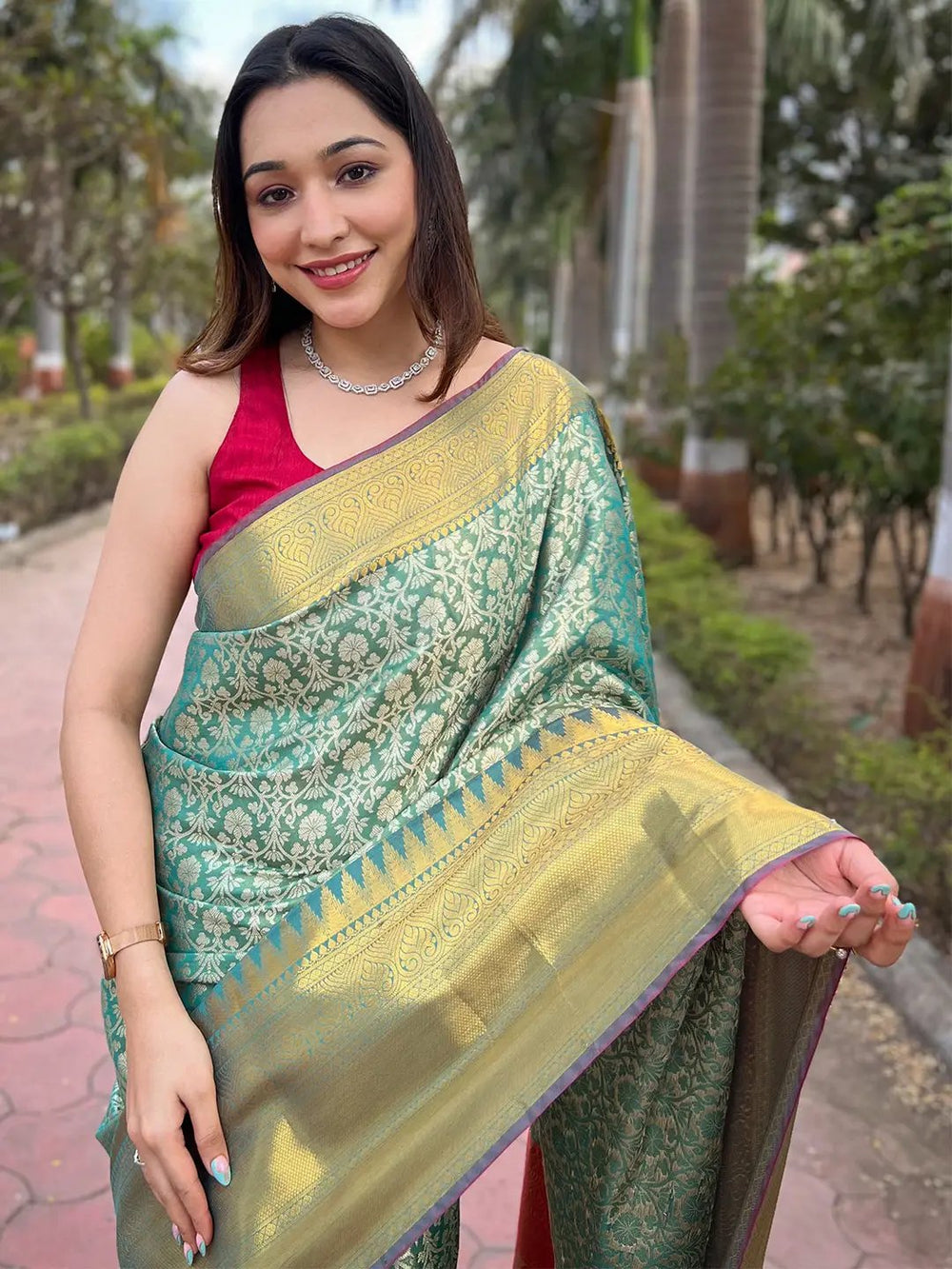 Green Banarasi Silk Saree with Gold Zari Weaving & Contrast Orange Border