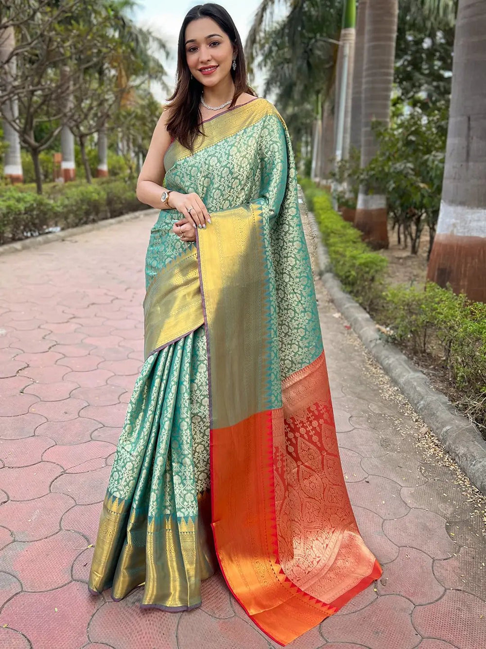 Green Banarasi Silk Saree with Gold Zari Weaving & Contrast Orange Border