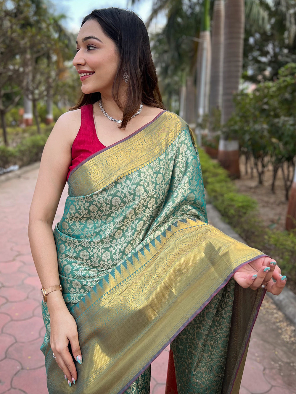 Green Banarasi Silk Saree with Gold Zari Weaving & Contrast Orange Border