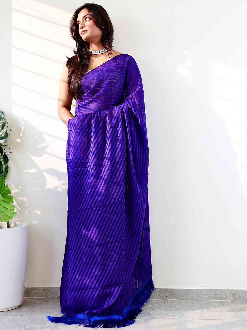 Royal Blue Pleated Organza Saree with Self Stripe Texture & Feather Tassel Border
