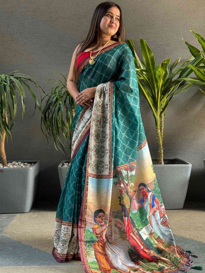 Teal Printed Silk Saree with Artistic Village Scene Pallu & Contrast Red Blouse Look