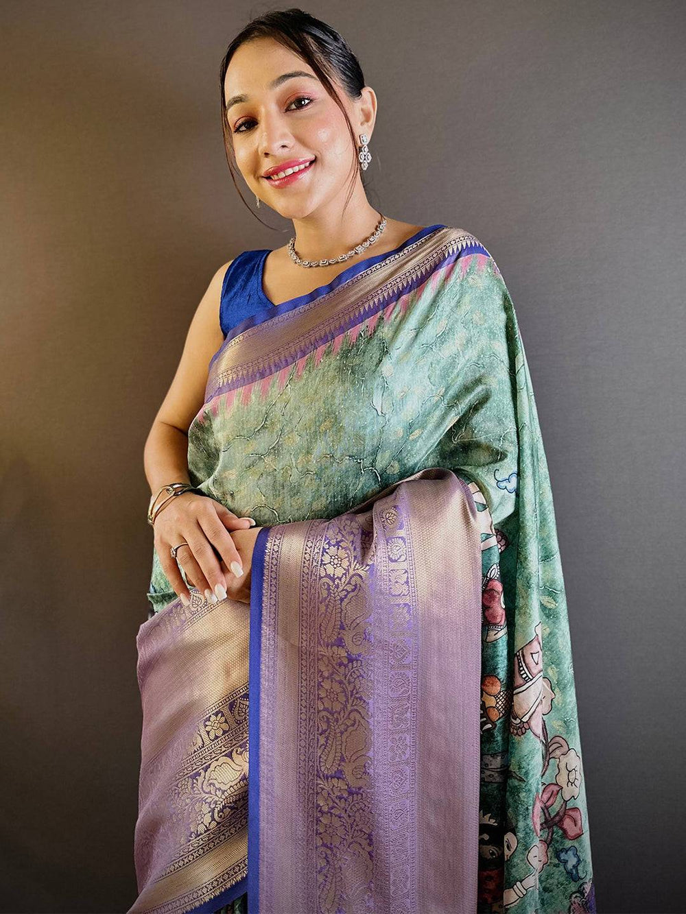 Elegant Green & Purple Banarasi Silk Saree with Royal Zari Border and Artistic Print