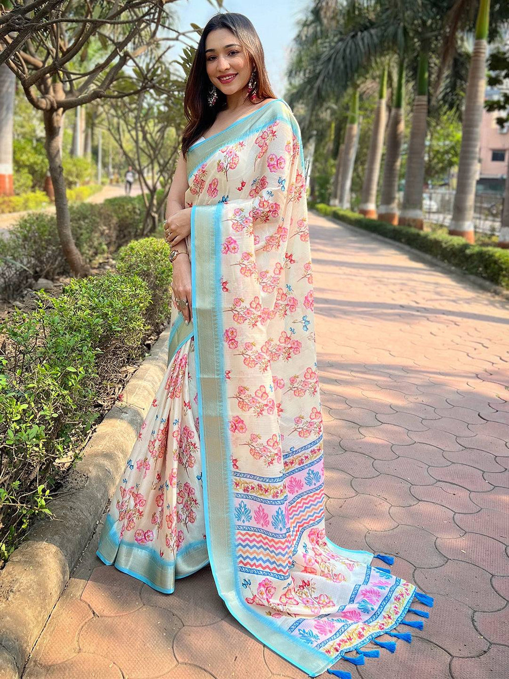 Cream Linen Silk Saree with Pink Floral Print & Sky Blue Border