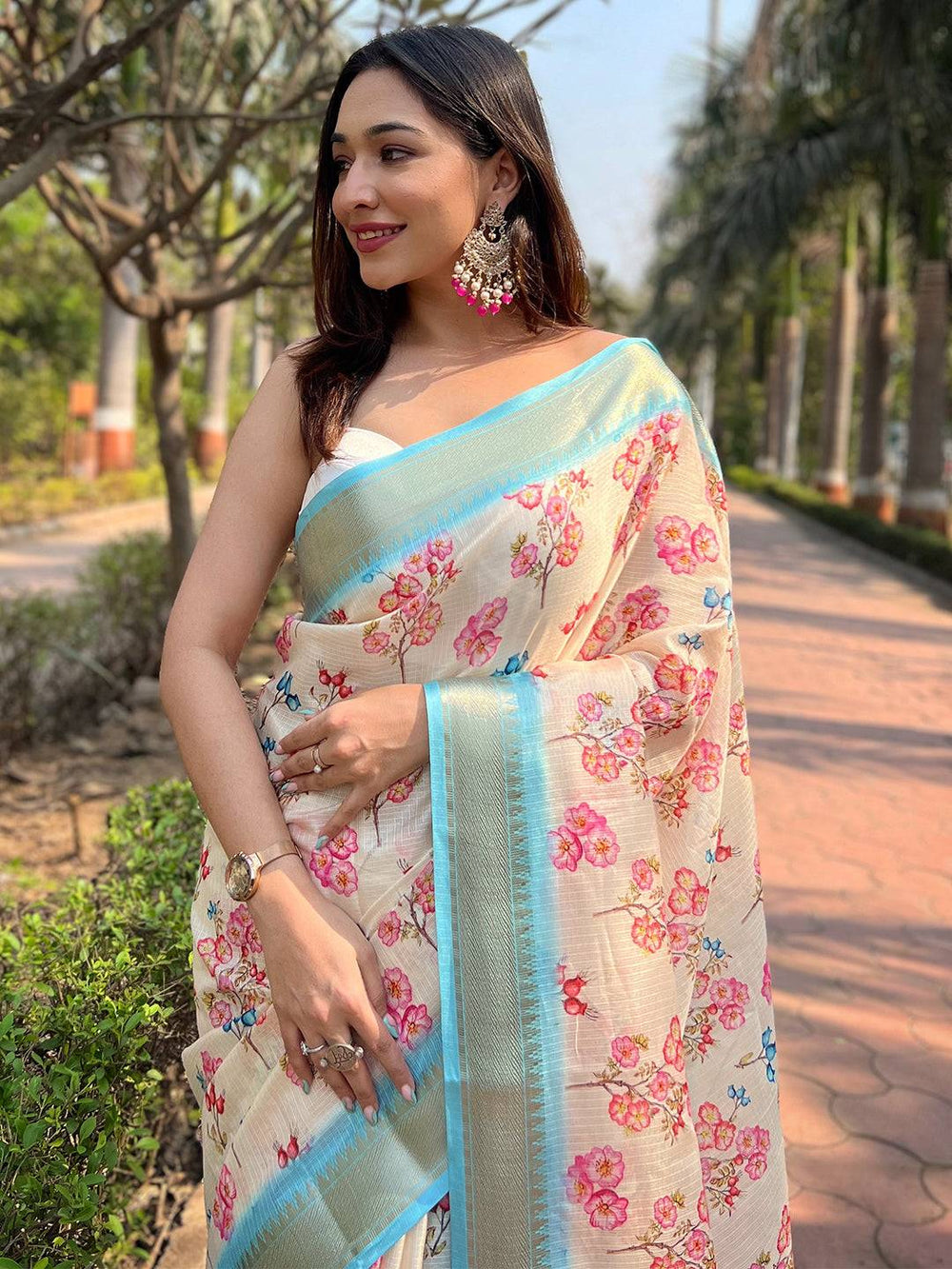 Cream Linen Silk Saree with Pink Floral Print & Sky Blue Border