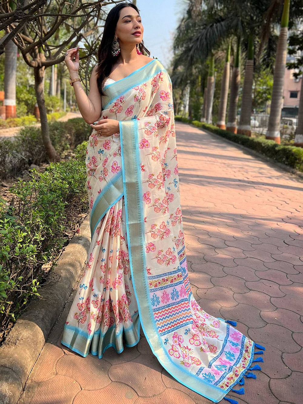 Cream Linen Silk Saree with Pink Floral Print & Sky Blue Border