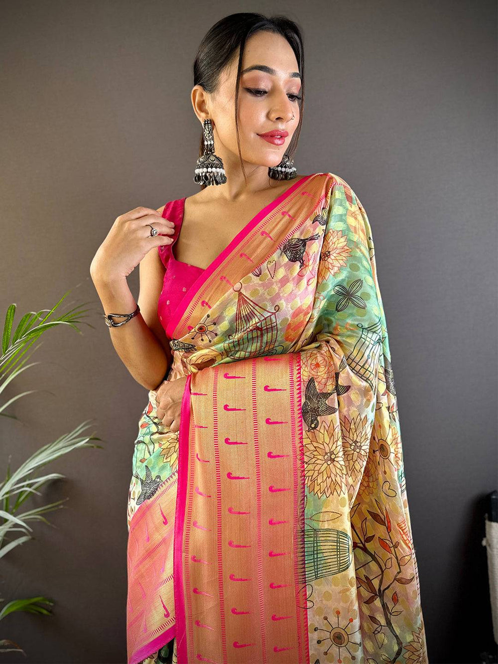 Peach & Pink Floral Banarasi Silk Saree with Golden Zari Pallu and Tassels