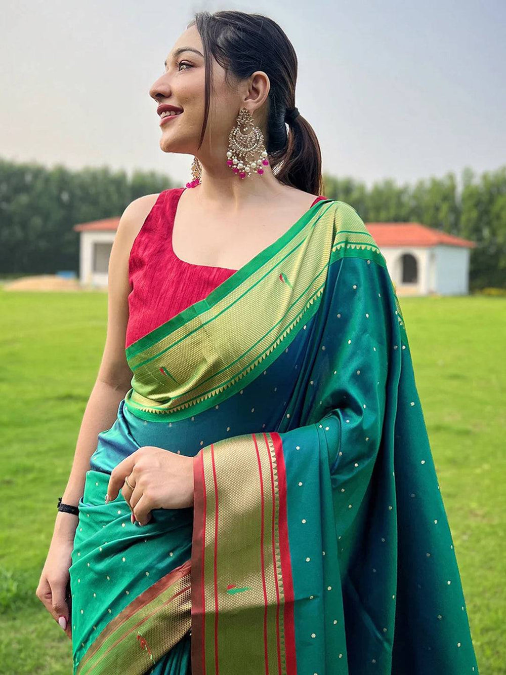 Teal Green Silk Saree with Golden Border & Peacock Motif Pallu