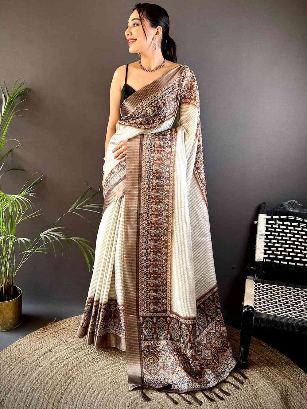 Cream & Brown Linen Silk Saree with Traditional Printed Border & Tassel Pallu