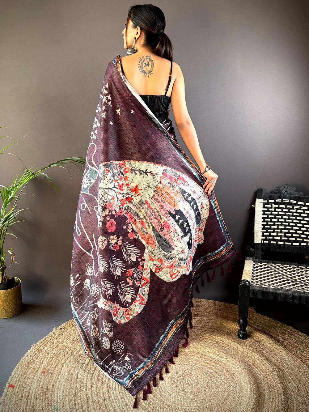 Maroon Linen Silk Saree with Artistic Floral Print & Tassel Pallu