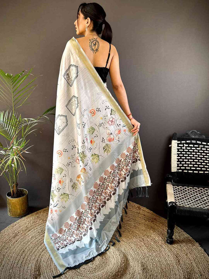 White Linen Silk Saree with Nature Inspired Print & Elegant Zari Border
