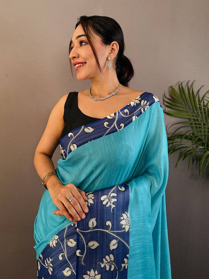 Turquoise & Navy Blue Linen Silk Saree with Floral Printed Border & Tassel Pallu
