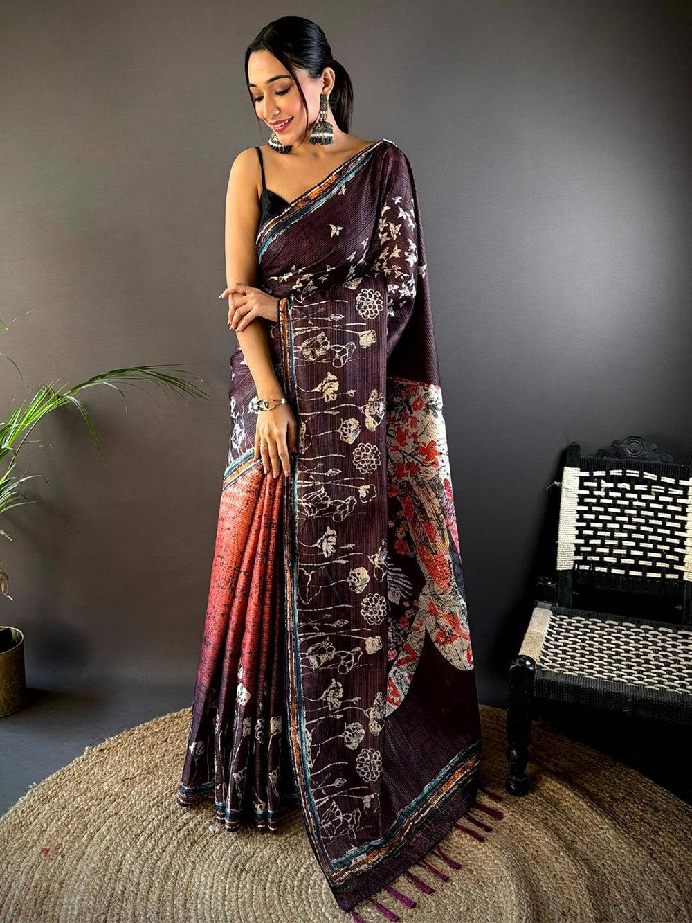 Maroon Linen Silk Saree with Artistic Floral Print & Tassel Pallu